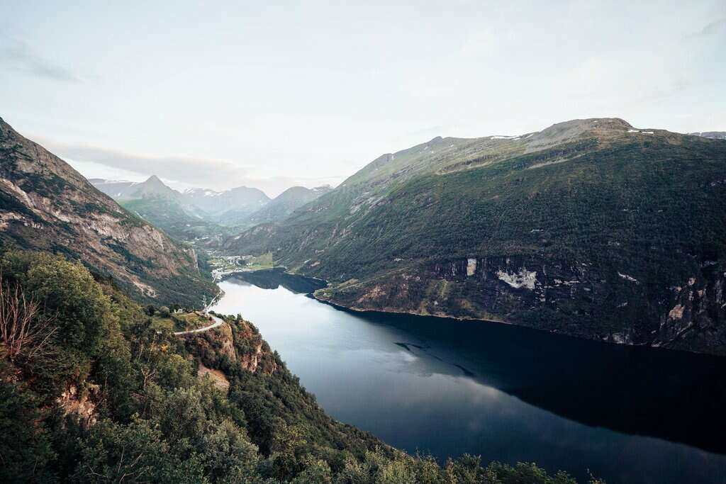 Geiranger Fjord. river in between mountains